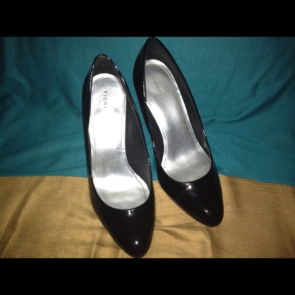 Shiny Black high heels.