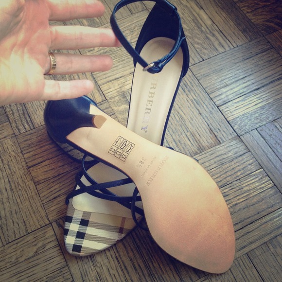 Authentic, never been worn Burberry heels.
