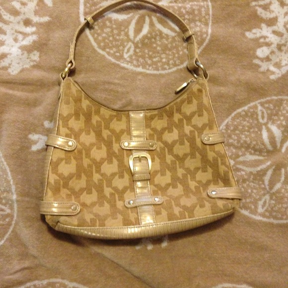 Ny &co tan with gold detail.