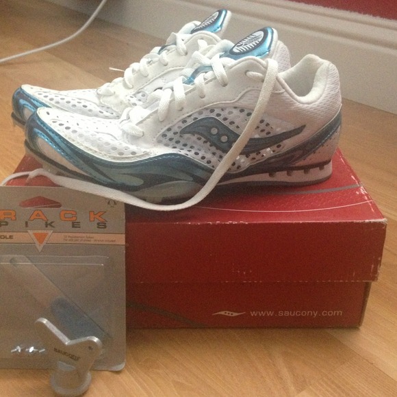Saucony shoes,with spikes and a tightener $15