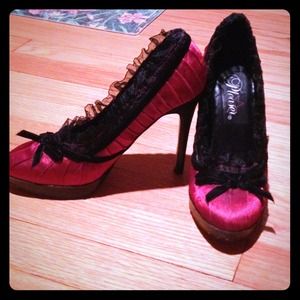 Red and black satin pumps