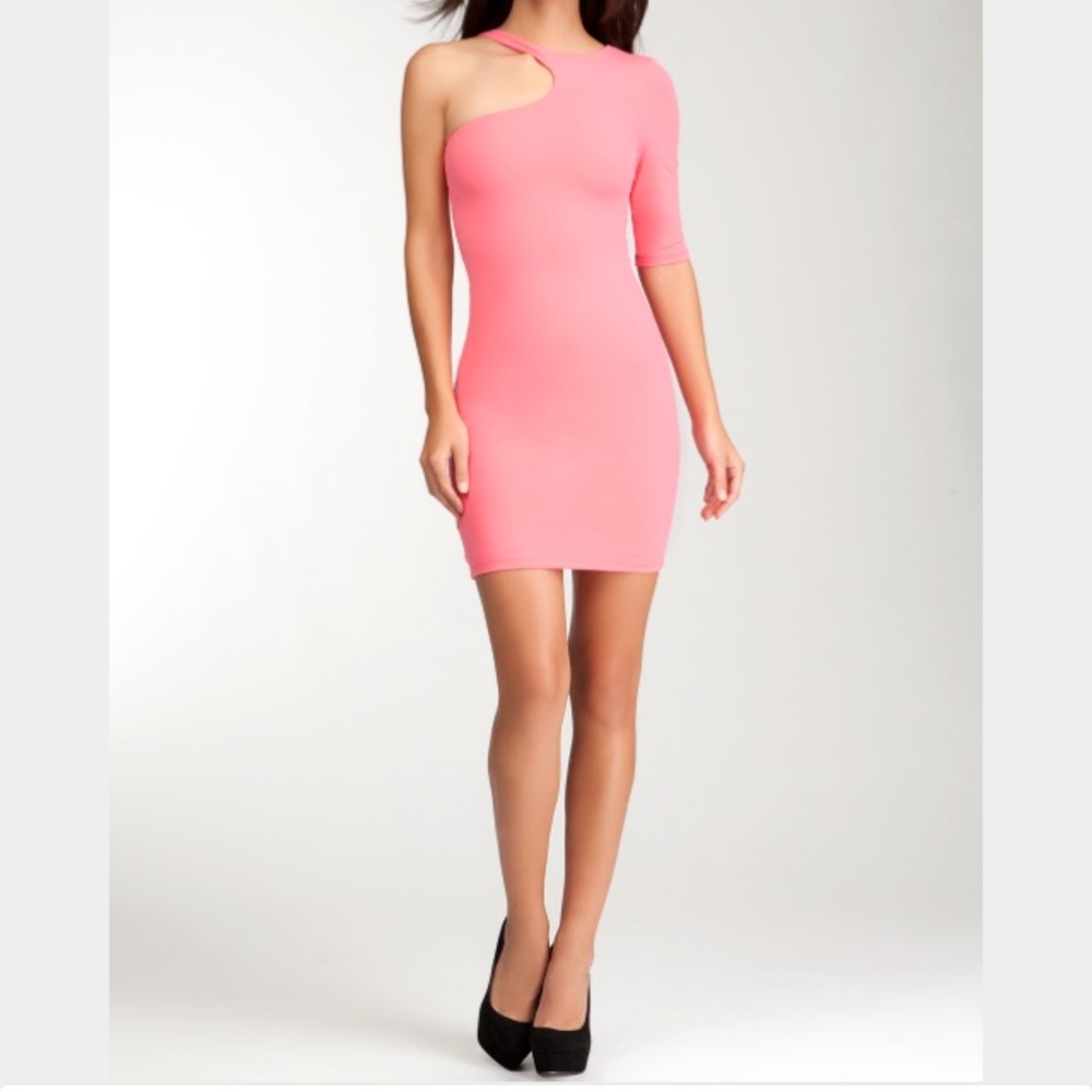 Bebe coral mini dress with sleeve cut out.