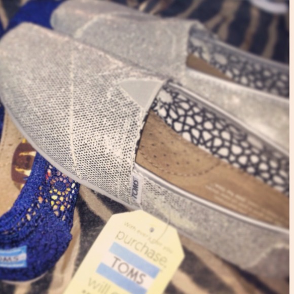 Sparkly silver TOMS sizes 7, 7.5, 8, and 8.5