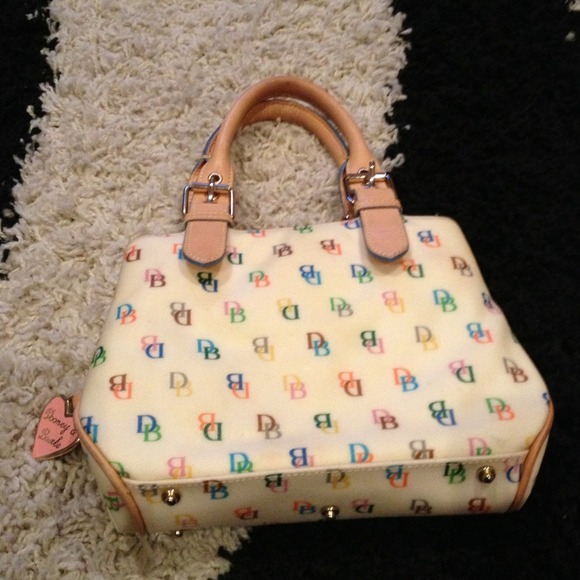 Authentic Dooney. Minor fading on one side