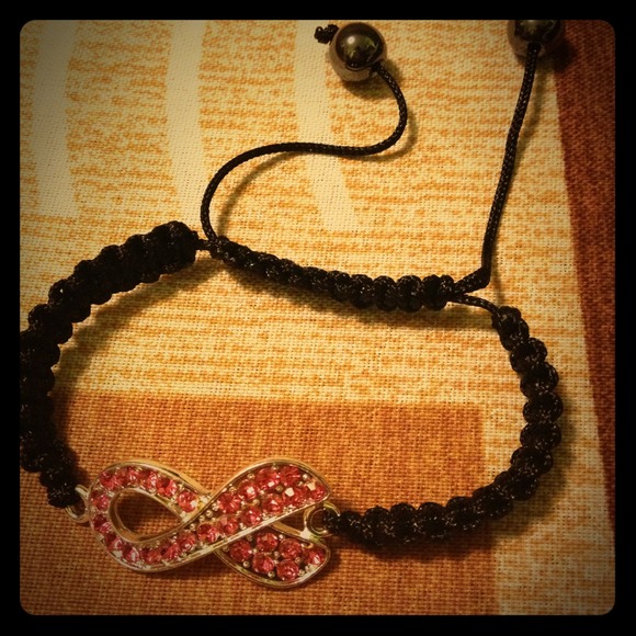 ✋⛔SOLD⛔✋Pink Rhinestone ribbon braded bracelet.