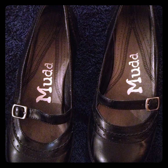Black Mudd Mary Jane style shoes