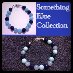 Matching bracelet and tear drop earring set.