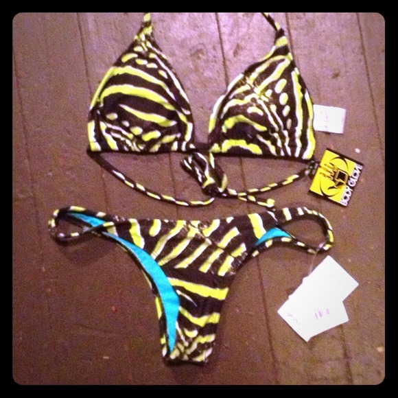 Green and black striped swimsuit