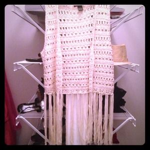 Knit vest with fringe at the bottom