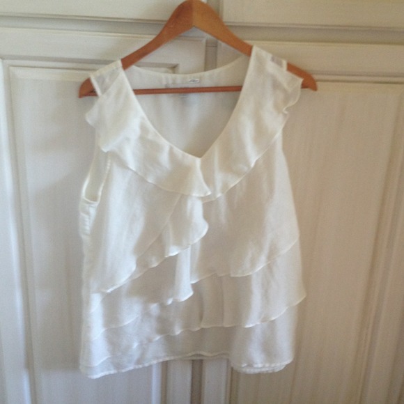 Casual  comfortable Sleeveless Off White top.