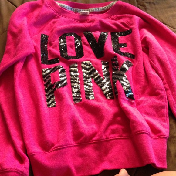 Pink sweatshirt. Sequin letters.