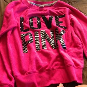 Pink sweatshirt. Sequin letters.