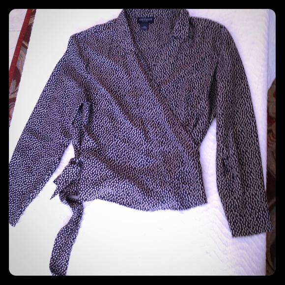 Long sleeve, cross-over blouse.