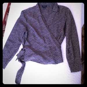 Long sleeve, cross-over blouse.