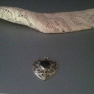 Heart shaped silver charm