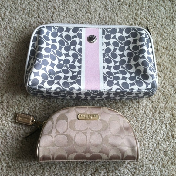 2 Coach cosmetic case" Reserved to Trade"