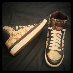 High top Coach shoes.