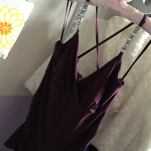 Purple top with diamonds straps.