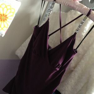 Purple top with diamonds straps.