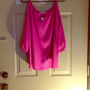 Fuchsia Cut Shoulder Shirt and gold heels