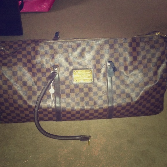 **RESERVE**TRADE ONLY lv duffle