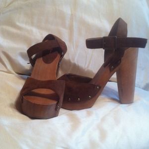 Wood and brown suede shoes