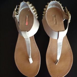 Spike heel nude sandals.