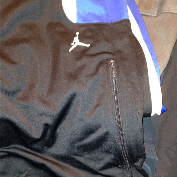 On hold for crazyw5,white and black warm up pants.