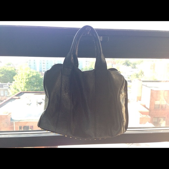 Bags - Black Studded focco bag . Trendy 😊 make offer Bags - Black Studded focco bag . Trendy 😊 make offer