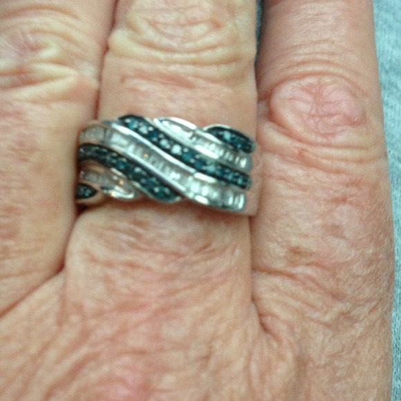 Blue and white diamonds set in white gold.