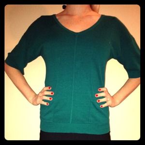 Dark green cable & gauge cardigan blouse.