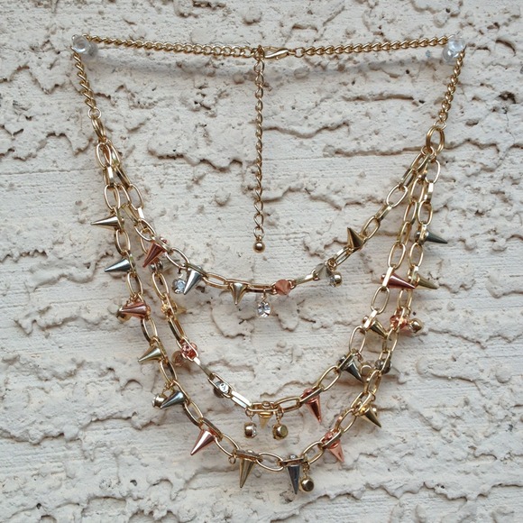 gold stud and jewel necklace
