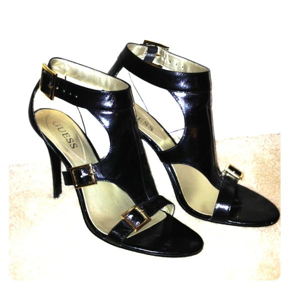 Black Guess Heels with gold buckle detailing