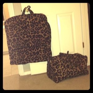 Leopard clothes carrier and duffle bag