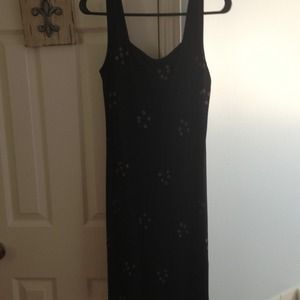 A little black dress with beautiful pink flowers.