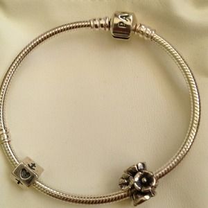Pandora bracelet with two charms