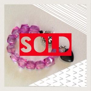 Tarina Tarantino purple lucite bracelet