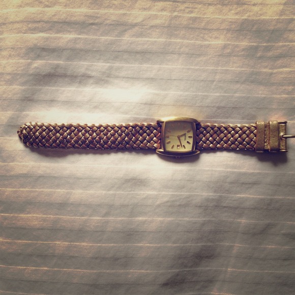 Authentic fossil gold leather watch.