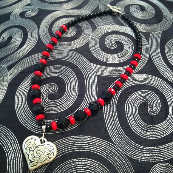 Red and black necklace with large heart charm