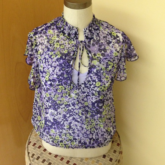 Purple flower top with interior attached tank.