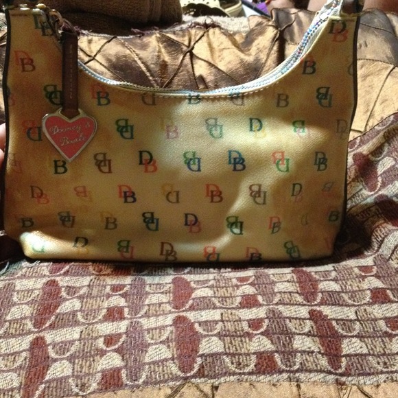 1⃣0⃣0⃣% Aithentic Dooney & Bourke!!! USED