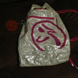 Zumba sling back bag. Silver glitter fabric.