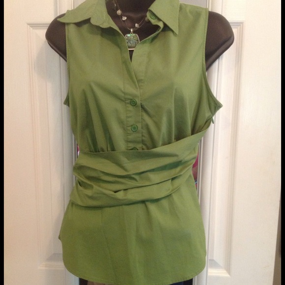 Green sleeveless blouse