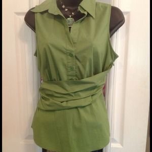 Green sleeveless blouse