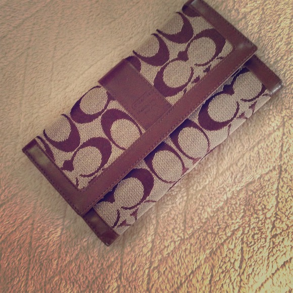 Authentic Coach wallet with removable check book.