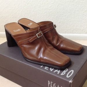Light brown leather mule with 31/2" stack heels.