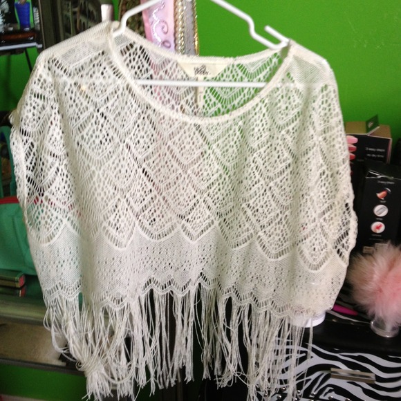 White fringed shirt.