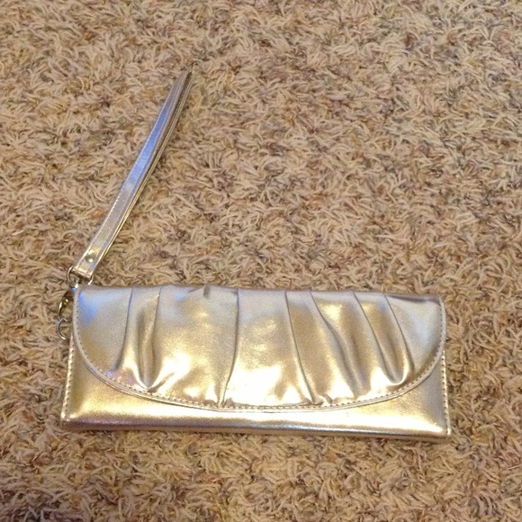 SOLD Gold wristlet clutch