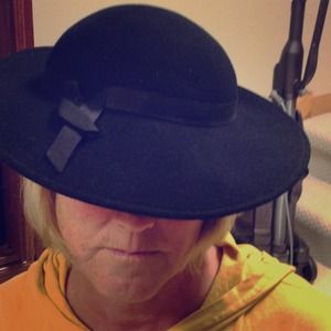 Wool hat. Has a strap to hold the hat on