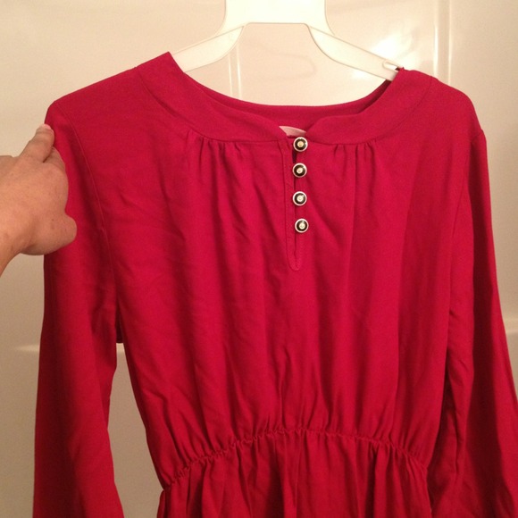 Red long sleeved dress with gold buttons